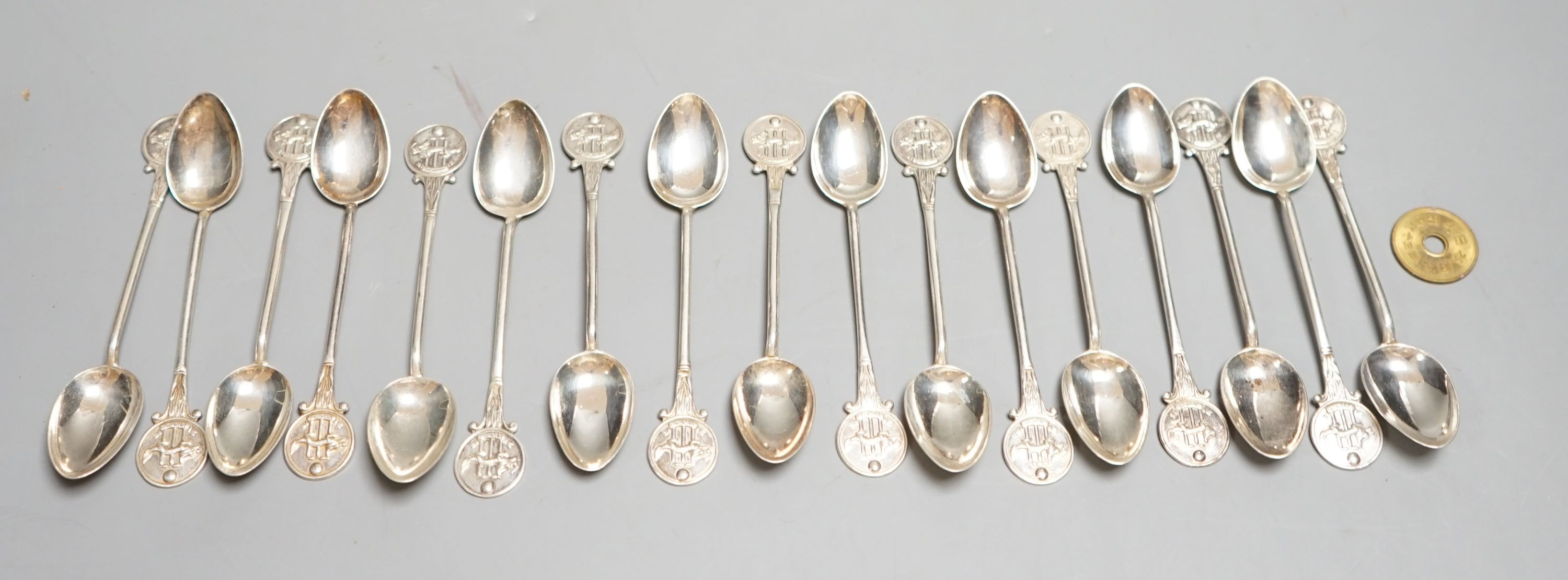 A set of seventeen early 20th century 'Hong Kong Cricket Club' coffee spoons, 10.6cm, 168 grams.